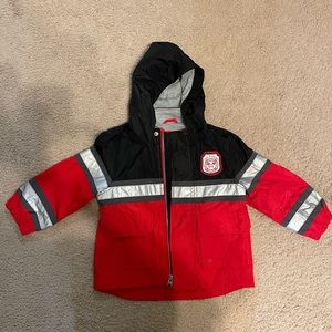 Carter’s Fire Man Raincoat Size 18 Months. It’s Red, Black and reflective silver